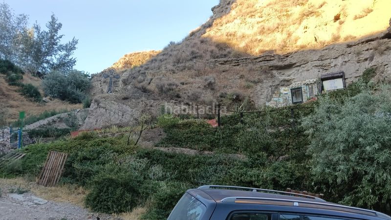 Foto 7e23f84a-2e56-4830-9d28-89de16338c51. Masia amb xemeneia aparcament a Baza