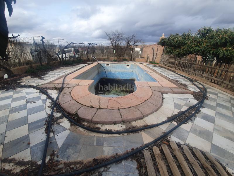 Foto c5f2df92-c40c-4ac1-a79a-bc9cc3a527bb. Finca rústica casa y piscina sobre finca rustica en Guadix