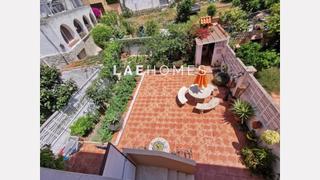 Casa adosada  Carrer carrer de marc aureli, 14. Encantadora casa adosada con jardín privado y garaje, a pocos mi