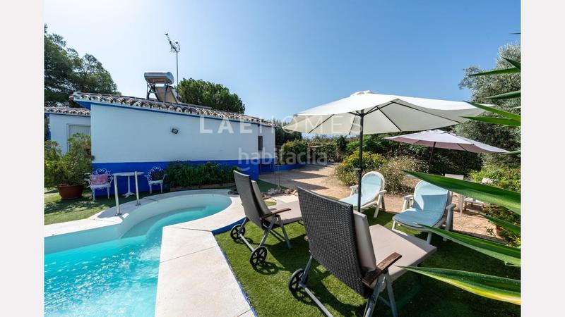 Foto 0f3d2bb4-24ba-4b3c-89ea-0b98370d7518. Mas avec parking dans Coín