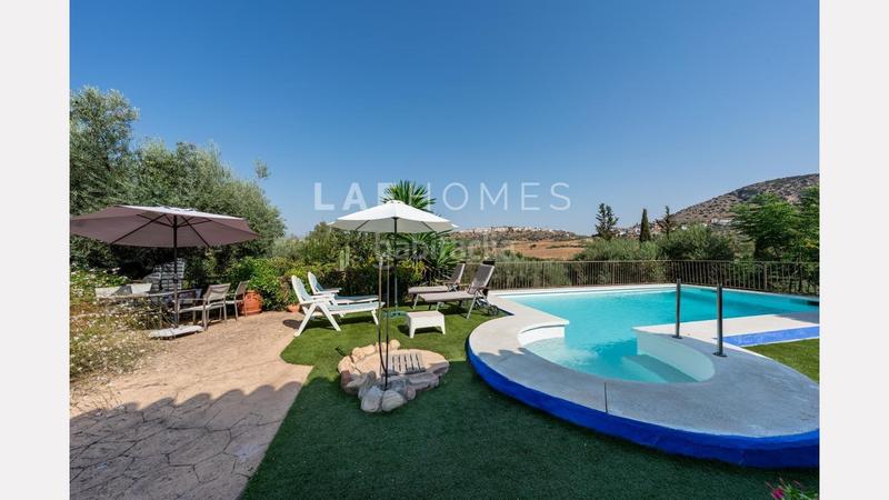 Foto 159ee4ba-0cbb-4d2f-b7c5-f66cf0808aa4. Mas avec parking dans Coín