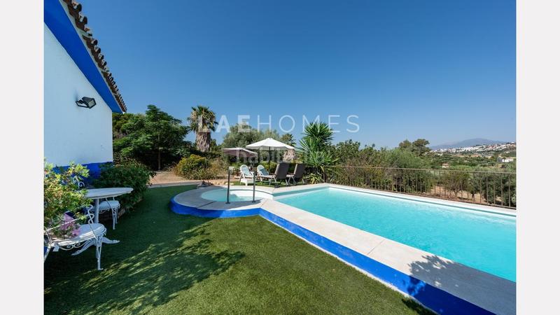 Foto f8c9e3ff-7663-48eb-b806-dbc4c0593ec7. Mas avec parking dans Coín