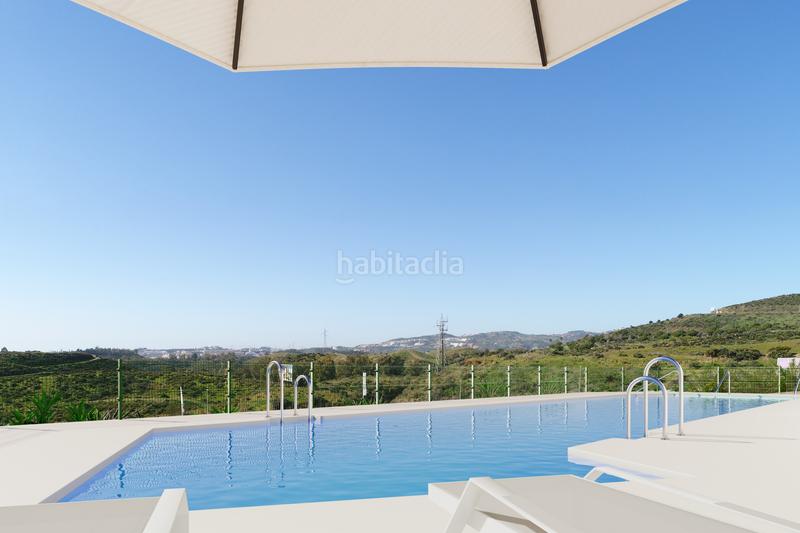 Foto 4325b8e3-6074-4ac8-b2af-71565ae20bb1. Apartamento moderno apartamento de 2 dormitorios con vistas al mar y a la montaña en la costa del sol en Mijas