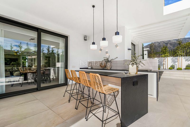 Foto ed9e7dcf-eda5-4db6-a81b-890c36d6287e. Casa amb aparcament piscina a Puente Romano Marbella