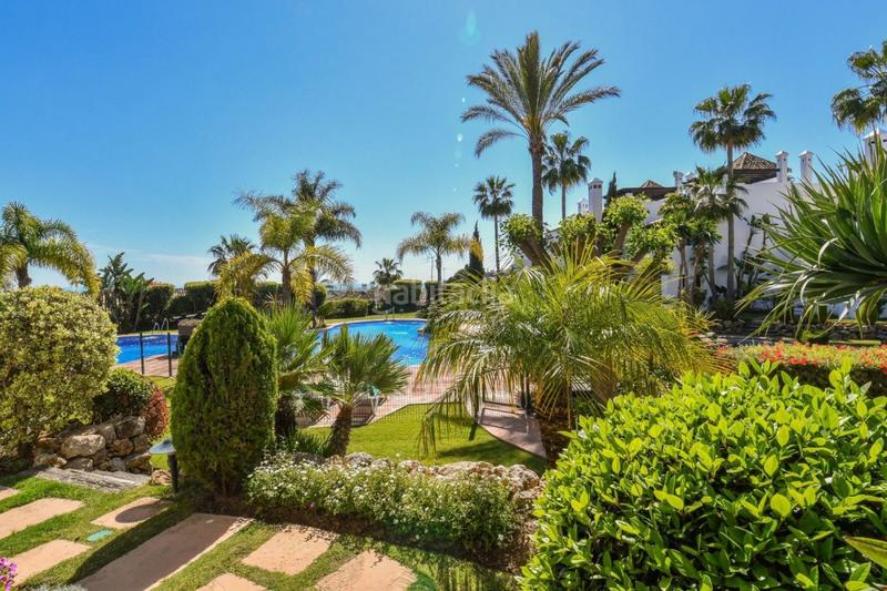 Foto 55f3c2d2-6586-41f4-8a6d-2f58bde099a6. Casa adossada amb calefacció aparcament piscina a Benahavís