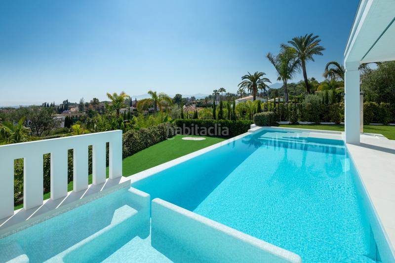 Foto 46b94bb9-7fa4-4eb0-a95d-32e1a717fa1f. Casa impresionante villa de lujo moderna en nagueles, con vistas panorámicas al mar y a la montaña. en Marbella