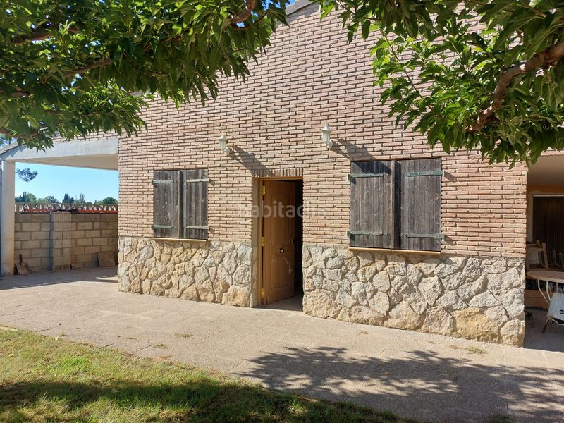Foto 0c78ea3d-34fc-49f0-9bdd-b2cb5ef3639f. Masia amb xemeneia aparcament piscina a Alfajarín