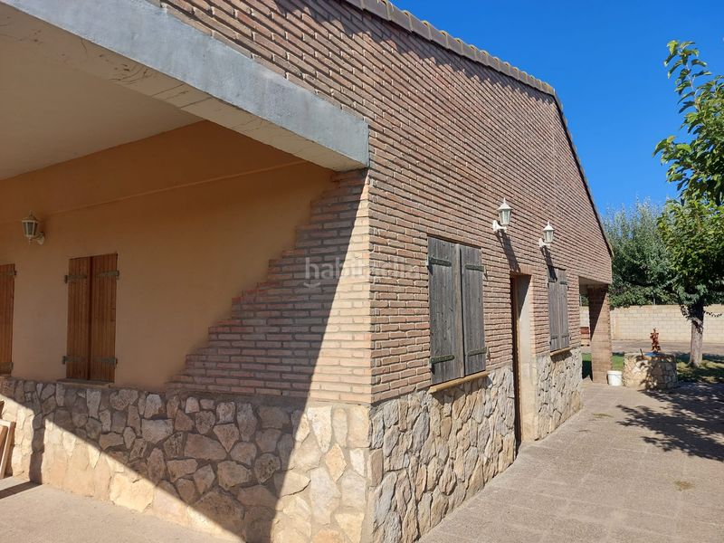 Foto 5505265d-4070-4bf7-b07d-bd8a9900bfd1. Masia amb xemeneia aparcament piscina a Alfajarín