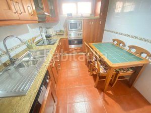 Foto 4a0a61ad-ab96-4bdc-8551-5c85e2341c3e. Maison jumelée avec cheminée chauffage parking dans Roquetas de Mar