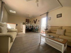 Foto ad9ae99d-36fd-4906-bab1-4a657ce93fc7. Maison jumelée avec cheminée chauffage parking dans Roquetas de Mar