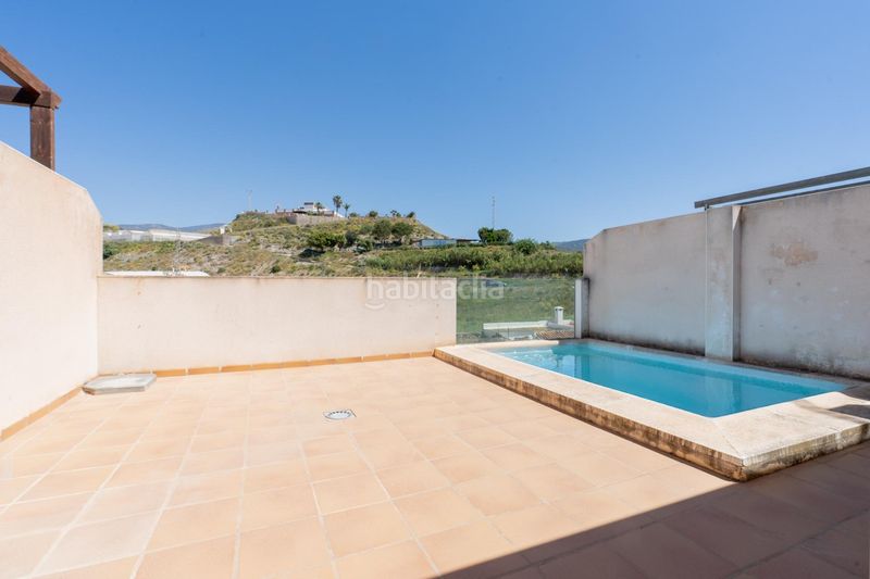 Foto f95d3610-81cd-4963-912a-6d4e5ada2a5c. Casa adossada amb aparcament piscina a Los Tablones - La Garnatilla Motril