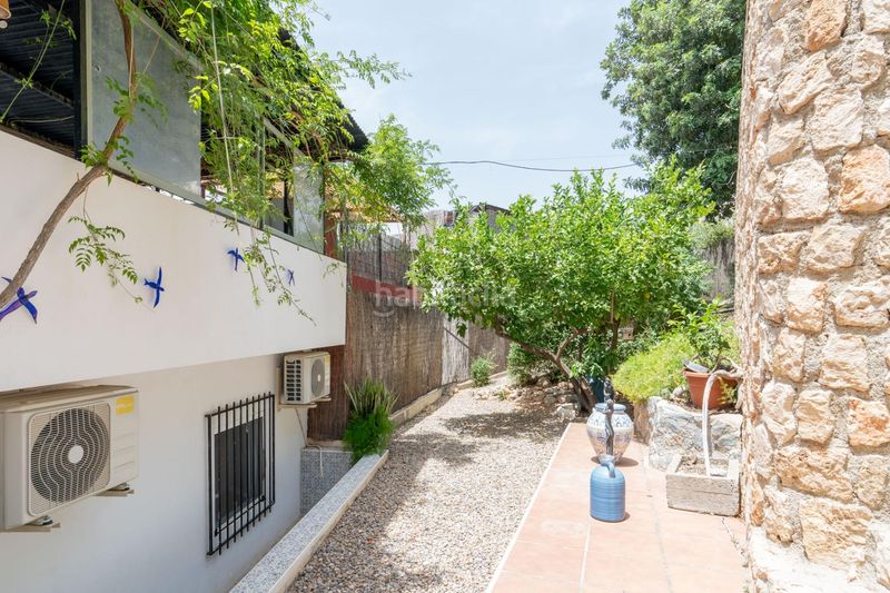 Foto b0bb3df9-73fd-41bb-a241-f5f2490fc53e. Casa amb piscina a Vélez de Benaudalla