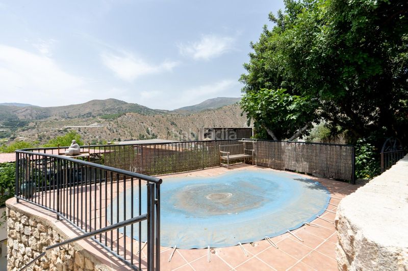 Foto f44c51fb-f7e0-4d20-bd6e-f394dadd91e5. Casa amb piscina a Vélez de Benaudalla
