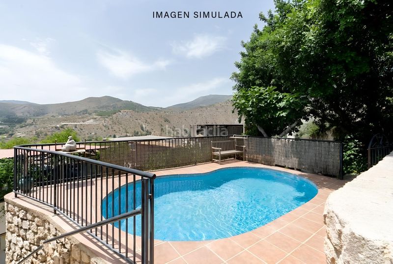 Foto fe07b8c0-03c2-4143-b9f6-eca49494dbcd. Casa amb piscina a Vélez de Benaudalla