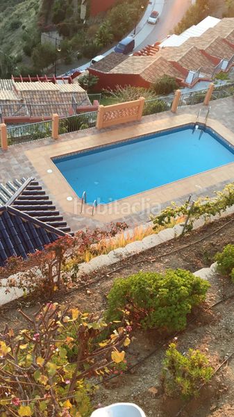 Foto 948c18f6-4712-43e4-9ba5-81b99d868150. Casa aparellada a urbanización El Peñoncillo 3 a Torrox