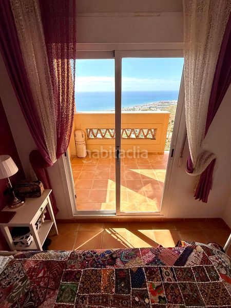 Foto f73c99d1-01e9-42d0-932e-37e3d7280a04. Casa aparellada a urbanización El Peñoncillo 3 a Torrox
