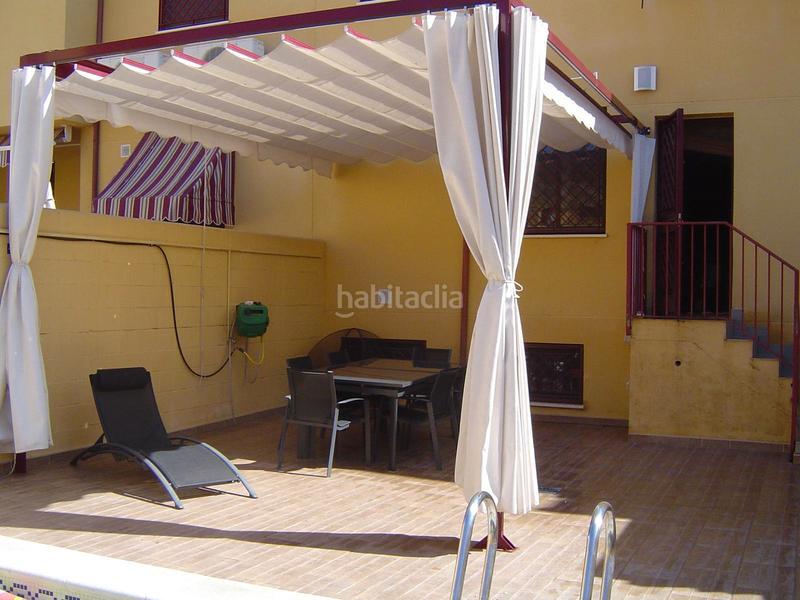 Foto 08d034ce-d3f6-43fa-9ec7-ec44cc4af3c3. Casa a schiera con riscaldamento parcheggio piscina in Córdoba