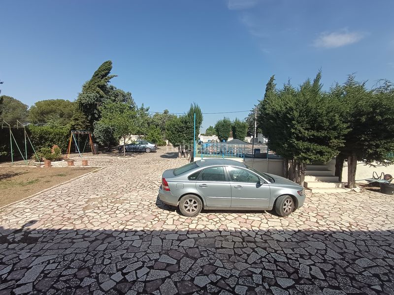 Foto df5a63a5-b5e6-43d7-ac6a-37dd37859f67. Xalet amb xemeneia aparcament piscina a Carlota (La)