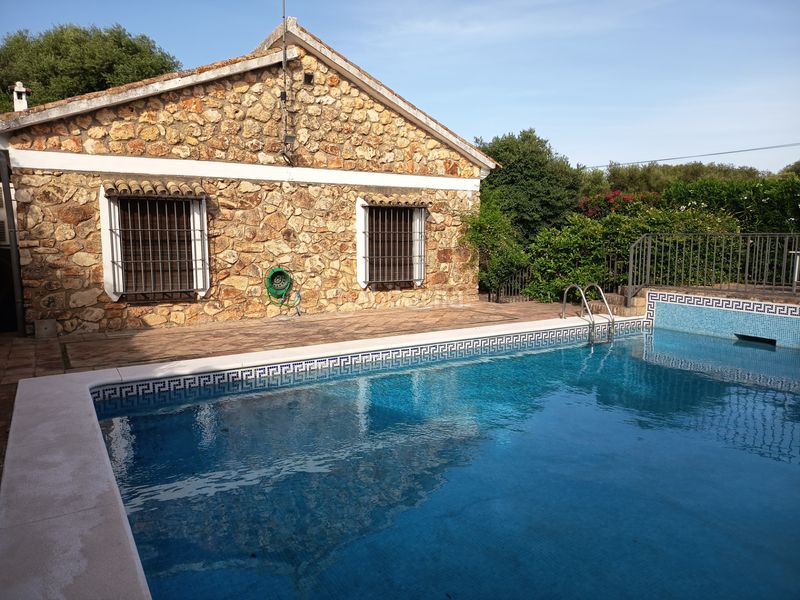 Foto abdfabdd-68ae-4af8-a521-a2f85a560dcc. Xalet amb xemeneia calefacció aparcament piscina a Palma del Río
