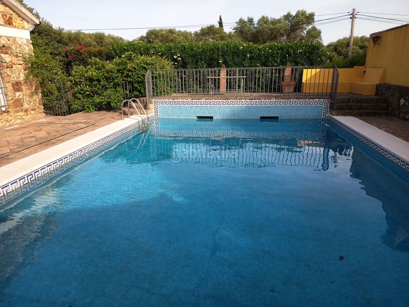 Foto d6cd32f1-3bb3-46db-9fc4-78d66da9da04. Xalet amb xemeneia calefacció aparcament piscina a Palma del Río