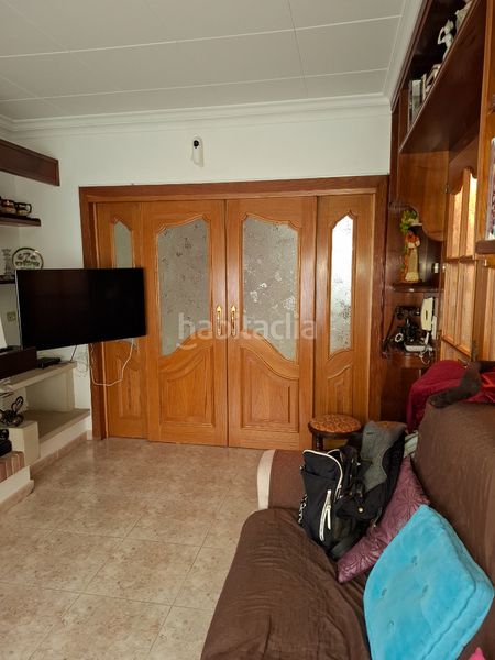 Foto 3094807a-a897-4287-9b03-ed9989b6126e. Casa aparellada amb xemeneia calefacció a Calella