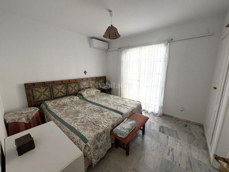 Foto c7c25ae5-b53d-45bd-975c-fdea561cc1b0. Casa adossada amb piscina a Los Boliches Fuengirola