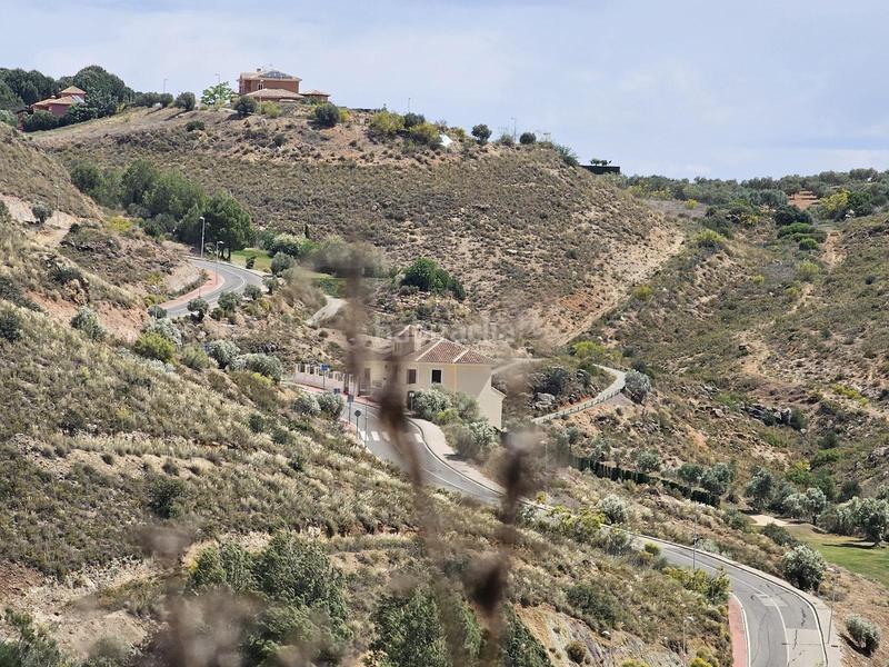 Foto 6f18ce7d-fb05-47b7-bd5e-3b5ca4659f20. Terreny residencial a urbanizacion Antequera golf 164 a Antequera