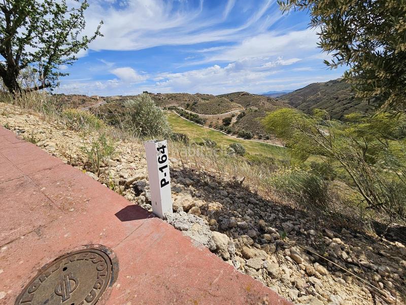 Foto dfe8051b-e999-462d-a3a9-19b79eeb4b98. Terreny residencial a urbanizacion Antequera golf 164 a Antequera