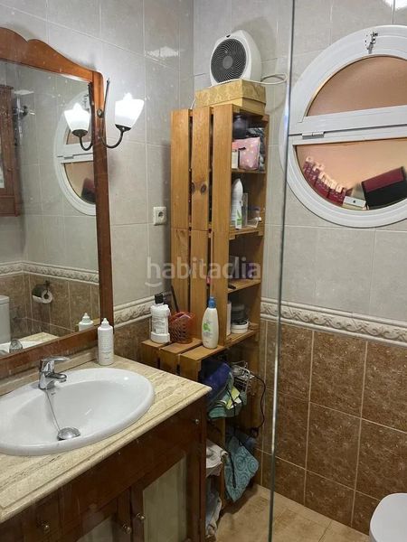 Foto 77c46410-9e1e-49ee-874d-7fc62bf513d2. Casa adossada amb aparcament piscina a Distrito Zeta - Recinto Ferial Cortijo de Torres Málaga