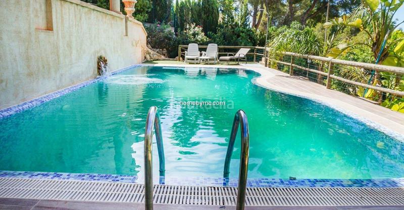 Foto 1dd5d6b3-1ace-4522-9505-3eb1ad27589b. Chalet espectacular chalet con vistas al mar en venta la vella en Altea
