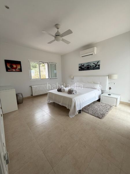 Foto b7c0f31f-aca5-402d-ace6-d45598e62a6b. Location chalet avec cheminée chauffage piscine dans Ibiza