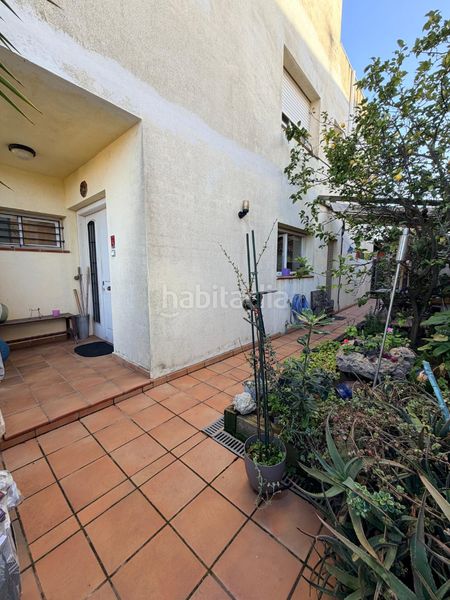 Foto 0edd447b-12c0-4e51-8db3-25a47dfb1a03. Casa aparellada amb calefacció aparcament a Malgrat de Mar