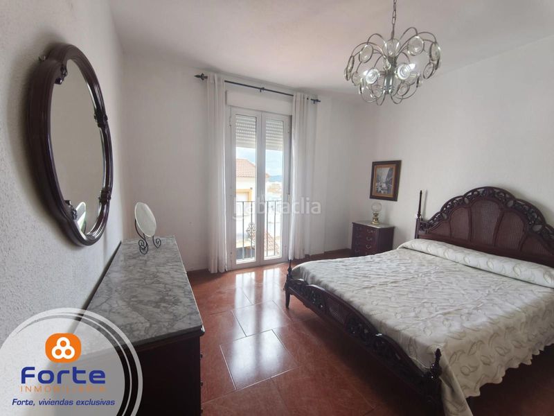 Foto f7bb1a98-2048-4896-a5d1-000448ddf16b. Casa amb calefacció a Almodóvar del Río