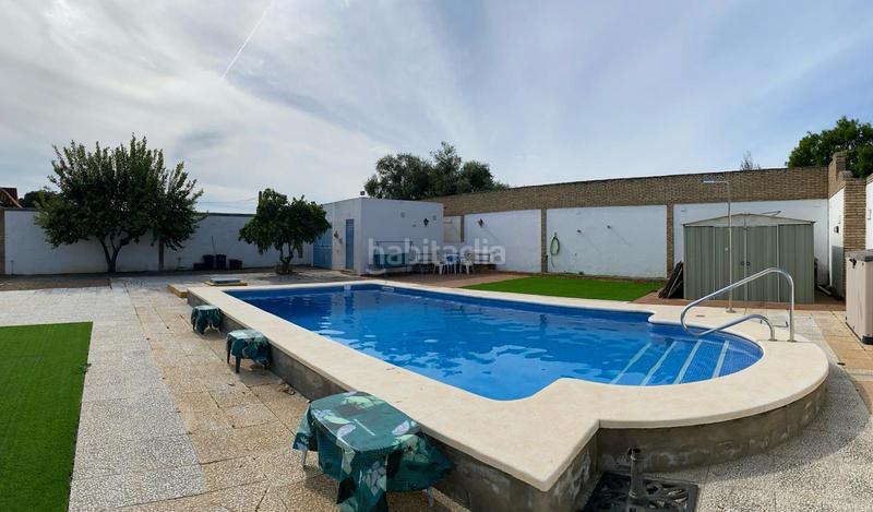 Foto 2e85fee2-4504-4c1c-826a-5017d6fbd210. Xalet amb xemeneia piscina a Oromana Alcalá de Guadaira