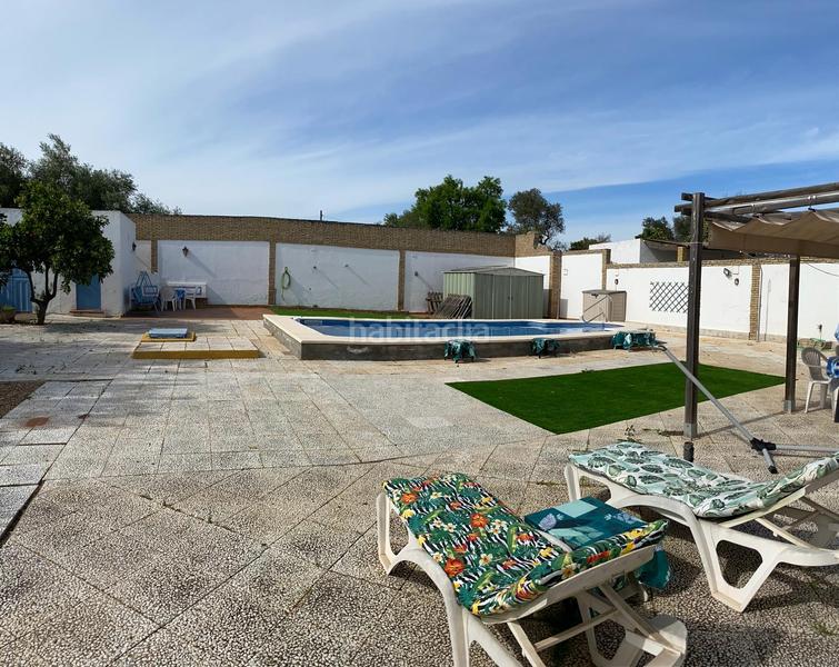 Foto 58e0208b-5481-444e-b793-f48df4d45d8e. Xalet amb xemeneia piscina a Oromana Alcalá de Guadaira