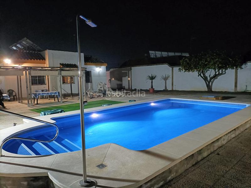 Foto 74688409-09d1-4b25-9396-0ea6ab0e1cf0. Xalet amb xemeneia piscina a Oromana Alcalá de Guadaira