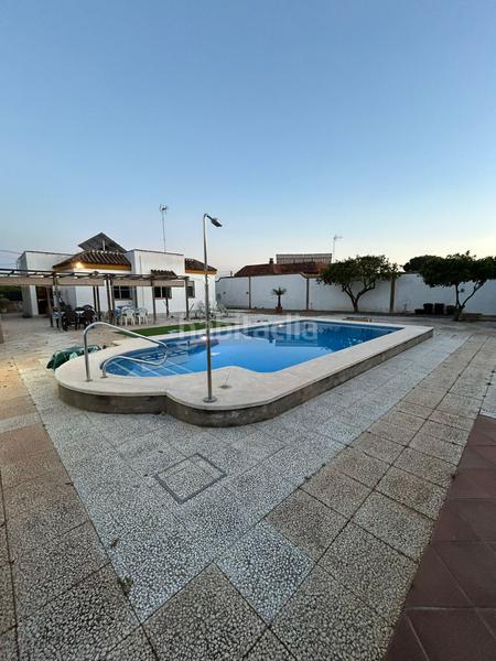 Foto 9a5e73a5-96c6-43ed-9892-004dc0bc042e. Xalet amb xemeneia piscina a Oromana Alcalá de Guadaira