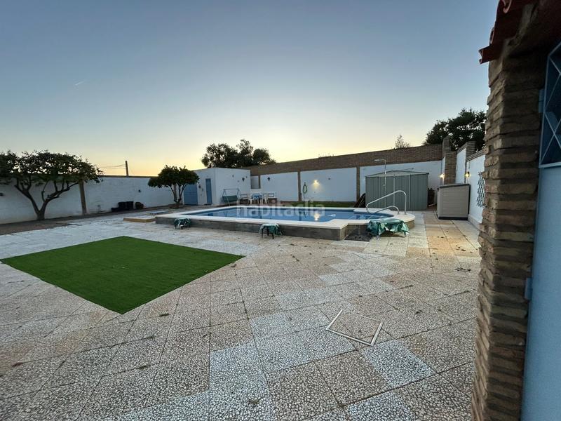 Foto a3b4928c-3621-481d-8210-02de6db94cf8. Xalet amb xemeneia piscina a Oromana Alcalá de Guadaira