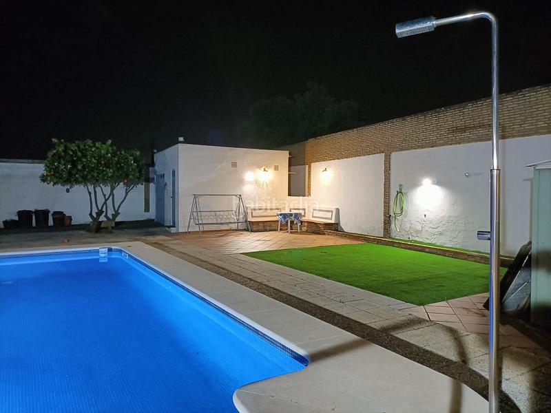 Foto ac4dedea-2202-485f-9e6b-86f3c47893ea. Xalet amb xemeneia piscina a Oromana Alcalá de Guadaira