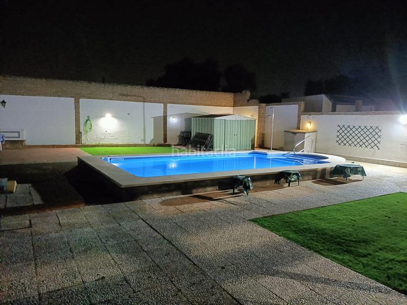 Foto ac9b4c6e-060b-4abf-9a7a-7426edd459d4. Xalet amb xemeneia piscina a Oromana Alcalá de Guadaira