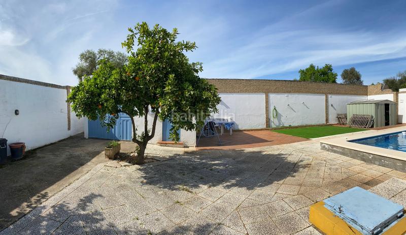 Foto cf2b2ed1-faa4-41b4-ab70-826cf01011cd. Xalet amb xemeneia piscina a Oromana Alcalá de Guadaira