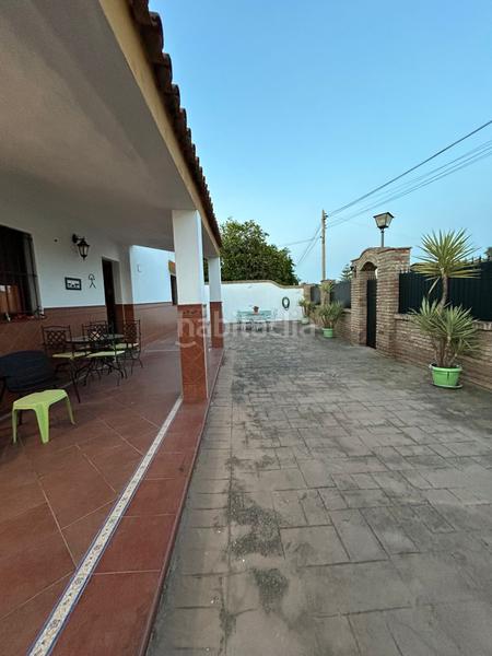 Foto d2be9138-8ec7-4a1b-8855-c5ea956b3da0. Xalet amb xemeneia piscina a Oromana Alcalá de Guadaira