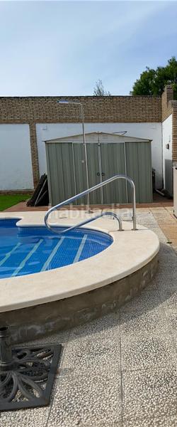Foto d9a1d106-a98a-43b4-857c-2c22d5f44e14. Xalet amb xemeneia piscina a Oromana Alcalá de Guadaira