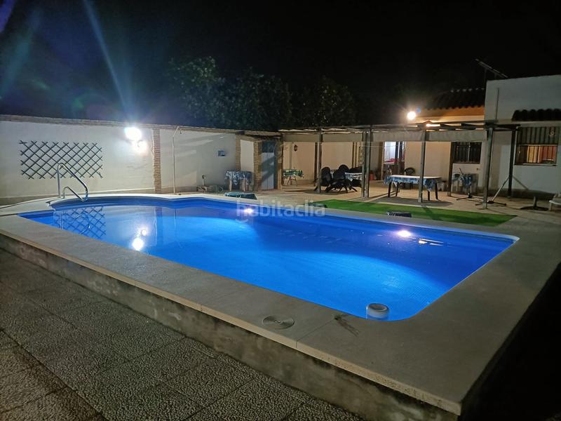 Foto dc345fc6-7446-4e04-8b45-b3b51915a40d. Xalet amb xemeneia piscina a Oromana Alcalá de Guadaira