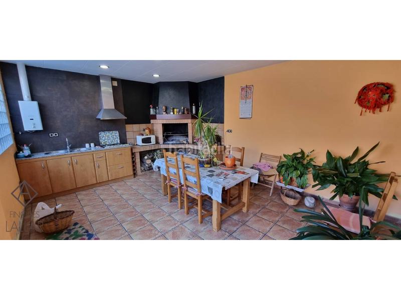 Foto 4772f1e8-bcc0-4e16-a817-d522b56308b8. Casa adossada amb calefacció aparcament a Font Verda Granollers