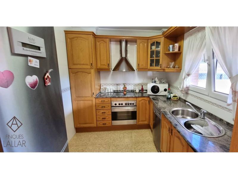 Foto c97cd3eb-9e71-4a6d-a4e1-0315c2e41e74. Casa adossada amb calefacció aparcament a Font Verda Granollers