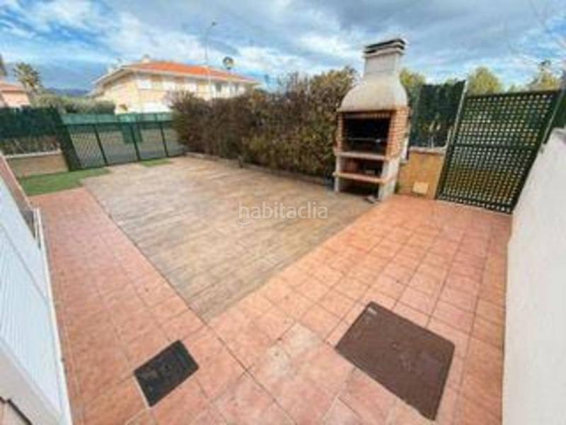 Foto 1ca953f0-dea3-498b-a2be-c6aaceea63ec. Casa a schiera con parcheggio piscina in Platja de Mont-roig Mont-roig del Camp