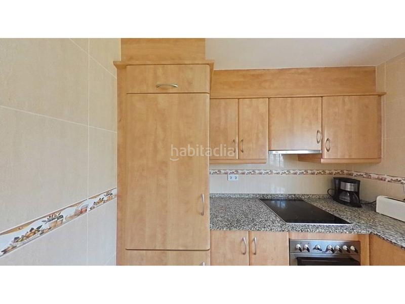 Foto 084ba609-3697-4873-9067-0345cd54c4f8. Reihenhaus mit parking pool in Passeig Marítim Miami Platja