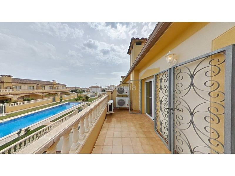 Foto 10f1987d-97e2-4585-9047-5fb5d60e99e9. Reihenhaus mit parking pool in Passeig Marítim Miami Platja