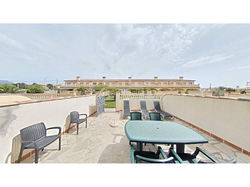 Foto 3aa63a4f-a9ce-46ff-91b9-dc25b487451a. Reihenhaus mit parking pool in Passeig Marítim Miami Platja